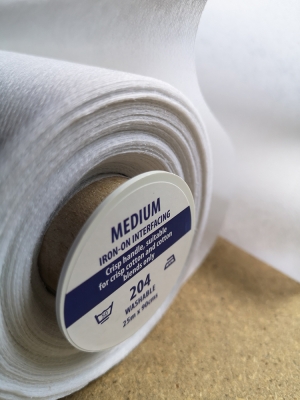 204w - Standard finish, medium weight iron on interfacing, White, 90cm wide x 25m
