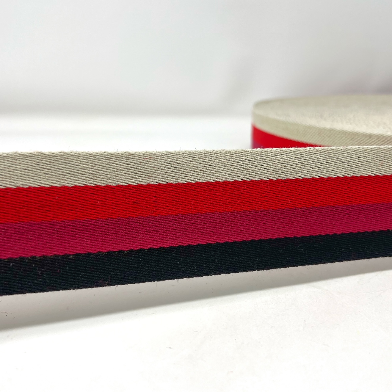 dw7750-06 BULK ROLL stripe webbing, black/reds/natural, 50mm. 45 metres - Image 3
