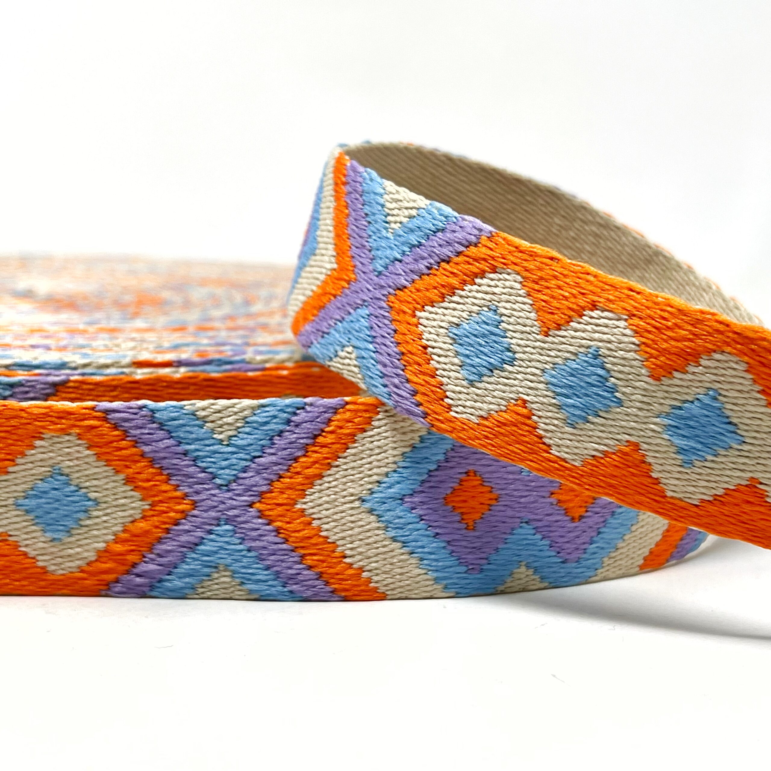 dw1974-135, 38mm tribal webbing, orange/stone/sky/lilac, 15m